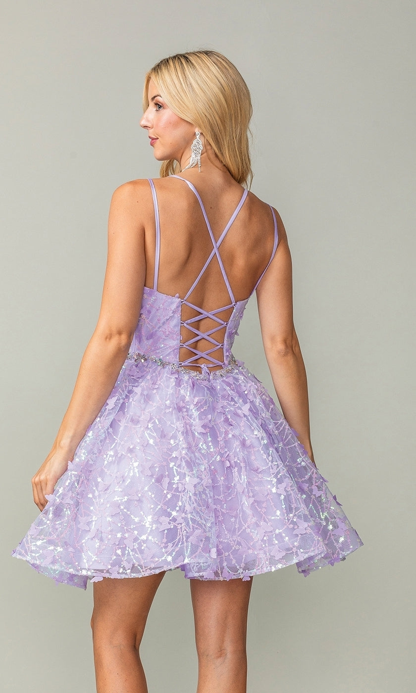 A woman models the Three-D Short Butterfly Homecoming Dress 3350, a light purple, sleeveless mini dress featuring a corset-style bodice, crisscross lace-up back, and sequin butterfly details against a plain background.